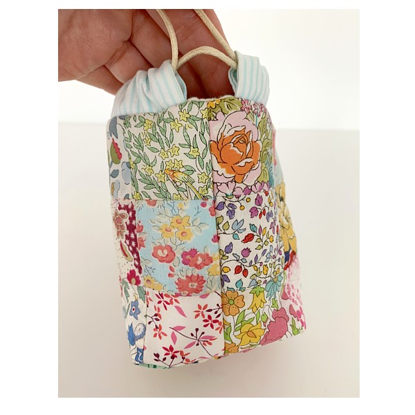 Cutest mini drawstring bag patchwork sewing Pattern by Tikki London made with Liberty London tana Lawn fabric