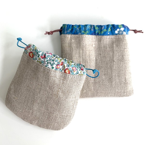 Make your own modern Mini Drawstring Pouch for ear plugs jewels and other small items Sewing Pattern by Tikki London with this great Sewing Pattern by Tikki London it's in print-at-home PDF format, another great TikkiLondon tutorial  made with Liberty London tana Lawn fabric