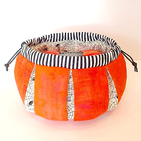 Trik or treat pumpkin shaped drawstring bag for Halloween sewing pattern in PDF dowanload format, designer Tikki London